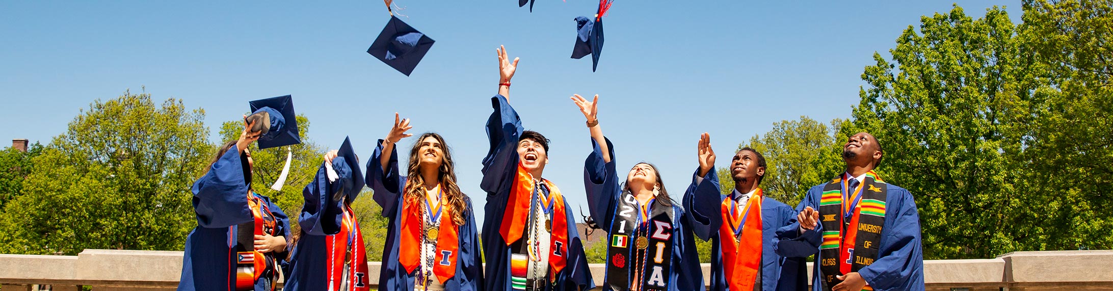 background image of students at graduation